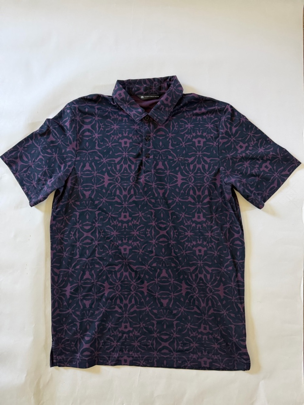 Travis Mathew Men's Short Sleeve Polo in Dark Blue and Purple Floral Pattern
